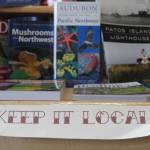 Photo by Karina Andrew/Whidbey News-Times
Wind and Tide Bookstore owner Karen Mueller has found her niche in the bookstore market by focusing part of her inventory on local guide and information books.