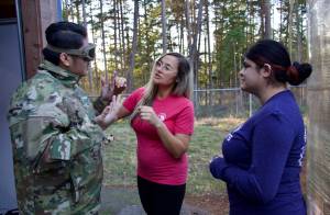 Photo by Rachel Rosen/Whidbey News-Times
Brittni Darbonnier and Julio Bucio show a pair of goggles to Justin Zafra.