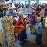 Well-wishers at Moonraker Bookstore bid adieu to the Goods. (Photo by David Welton)