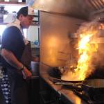 Photo by Karina Andrew/Whidbey News-Times
Ben Jones heats things up in the kitchen at Oystercatcher.