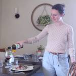 Photo by Karina Andrew/Whidbey News-Times
Sophia Kitay serves a meal and pours wine at Oystercatcher.