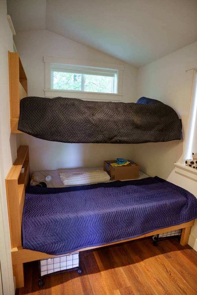 Bunk beds save space in the tiny houses.