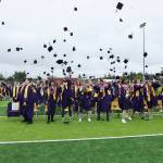 Oak Harbor High Schools class of 2023 toss their caps in the air following their commencement ceremony. (Photo by John Fisken)