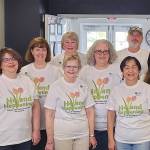 Left: Teri Mendiola, Community Relations Director and Wayne Dorrenbacher, Community Relations Assistant accepting Regency on Whidbeys Large Business of the Month award from the Oak Harbor Chamber. Middle: Regency on Whidbey was one of the apparel sponsors for Holland Happening through the Oak Harbor Chamber. Right: Coupeville Mayor Hughes, Regency-Pacific owners Bart and Sandy Beddoe, and a member of the Coupeville Chamber board.