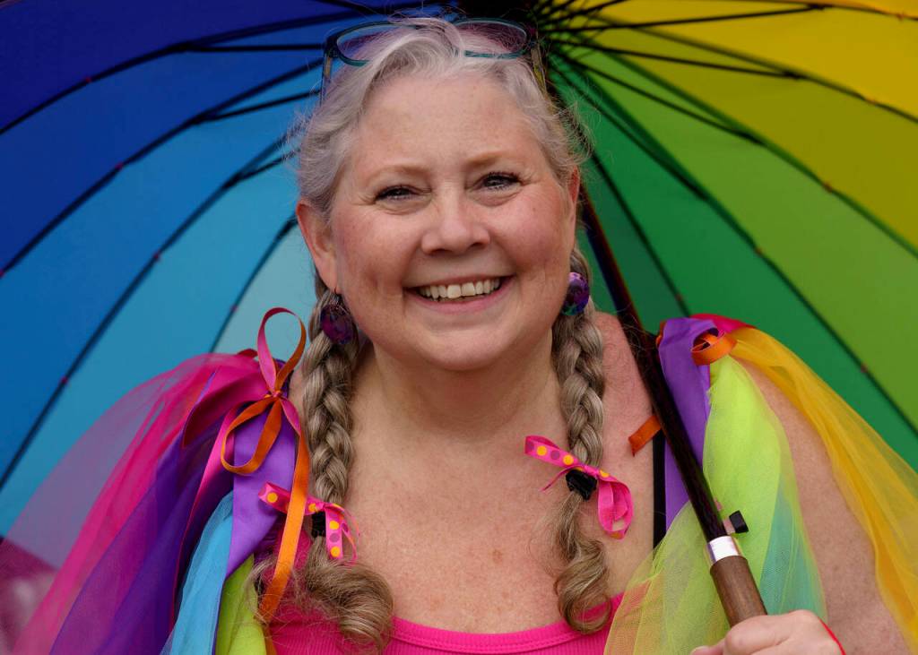 Vivian Rogers Decker walks in Coupevilles first pride parade June 17. (Photo by David Welton)