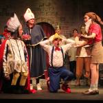 From left, Logan Hendricks as Lord Farquaad, Kinley Quayle as the Bishop, Cillian Burke as Pinocchio and Thorin Allen as the Dwarf perform a scene in which the Dwarf reveals a startling secret about Dulocs wicked ruler.
