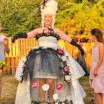 Betsy Harvey models a Marie Antoinette dress created by Val Johnson out of chicken wire, bird netting, chicken feathers and tarps. (Photos by Wendy Ashford)