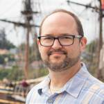 Erich Ebel, author of Exploring Maritime Washington, with the Lady Washington. (Photo provided)