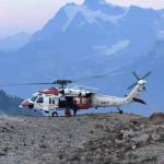 Official Navy Photo
NAS Whidbey Islands SAR crewmen depart the aircraft on their way to prepare an injured hiker for transport to St. Josephs Hospital in Bellingham.