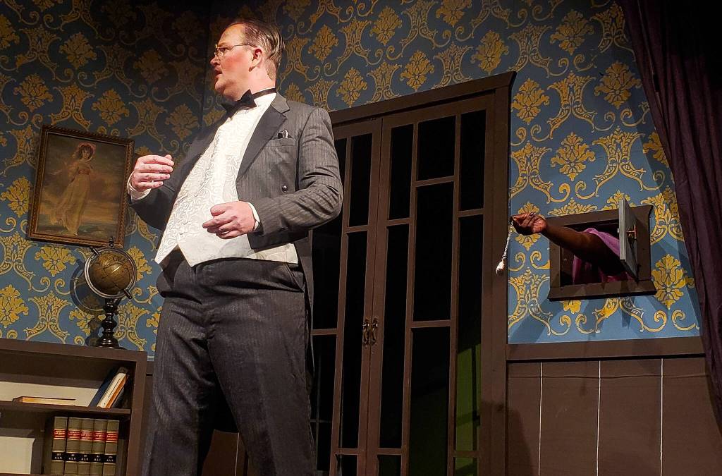 Phyllis helps out Saul Watson/Dr. Rex Forbes (played by Eric George) during the premiere of her play. (Photo by Luisa Loi/Whidbey News-Times)