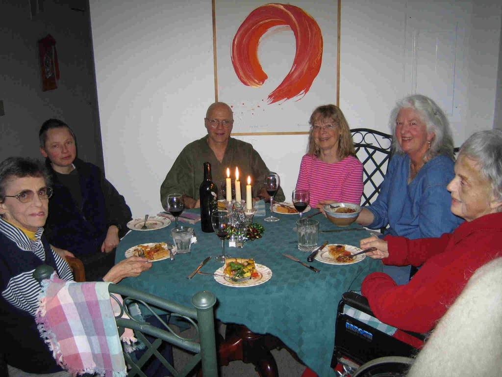 Photo provided
Guests, volunteers and staff of Enso House share a meal.