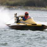 A hydroplane vessel races in Oak Harbor Bay Sept. 10. Whidbey residents flocked to the Oak Harbor shoreline this weekend to watch hydroplanes race around the bay. More than 30 competitive race heats took place Sept. 9 and 10, supplemented by a beer garden, car show and Navy demonstrations. Hydros for Heroes is a nonprofit event, with all proceeds supporting local heroes including military personnel, healthcare professionals, first responders and teachers. (Photo by John Fisken)