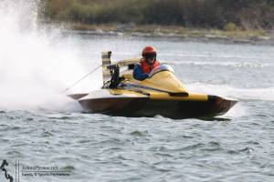 A hydroplane vessel races in Oak Harbor Bay Sept. 10. Whidbey residents flocked to the Oak Harbor shoreline this weekend to watch hydroplanes race around the bay. More than 30 competitive race heats took place Sept. 9 and 10, supplemented by a beer garden, car show and Navy demonstrations. Hydros for Heroes is a nonprofit event, with all proceeds supporting local heroes including military personnel, healthcare professionals, first responders and teachers. (Photo by John Fisken)