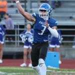 South Whidbey junior quarterback Cody Redford throws a pass during the Friday night game. (Photo by John Fisken)