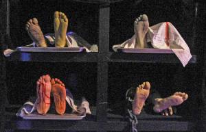 Photo by Luisa Loi
Decaying human remains lay on a body mortuary storage rack.