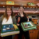 Photo by David Welton
Pia Stewart and Jennifer Holmes showcase some of their most creative cake displays, which include a Whidbey theme with a ferry dock made out of Kit Kats and Mario Kart characters.