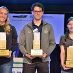 Jadan White, center, placed second at the Washington State Best Bagger Competition in Shoreline. (Photo provided)