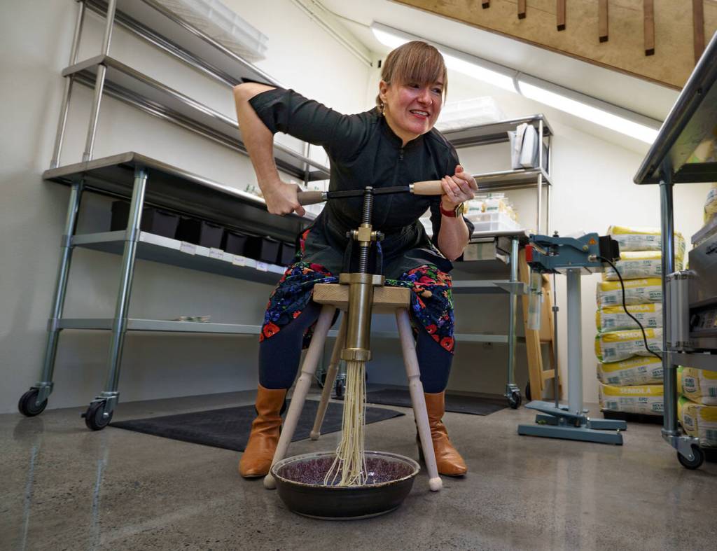 Echo operates a replica of the first pasta machine from the late 19th century. (Photo by David Welton)