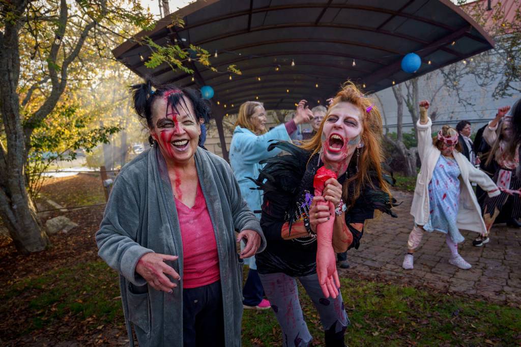 Joanne Stroup, left, and Autumn Duenow embraced their zombie sides. (Photo by David Welton)