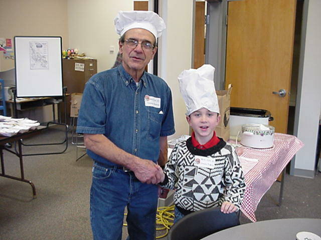 Thomas Arhontas, the founder of Mobile Turkey Unit, with Jim Camby in 2000. (Photo provided)