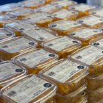 Boxes of cubed sugar Hubbard squash wait to be sold. (Photo provided)