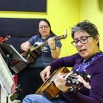 Right to left, Candy ONeal and Melissa Johnson play at the Guitars for Vets Sunday Jam. (Photo by Luisa Loi)