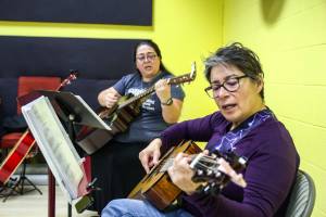 Photo by Luisa Loi
Right to left, Candy O'Neal and Melissa Johnson play at the Guitars for Vets Sunday Jam.