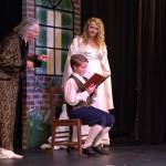 The Ghost of Christmas Past (Amy Jones) takes Scrooge (Ben Honeycutt) back to his childhood. (Photo by Luisa Loi)