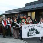 The Whidbey Playhouse joined Santas parade as characters from A Christmas Carol. (Photo by Luisa Loi)