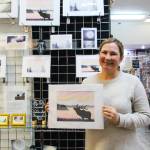 Hannah Sewell holds her art piece dedicated to Bruiser, Whidbeys lone elk. Sewell is one of the artists showcased at Whidbey Island Crafters Market Studios. (Photo by Luisa Loi)