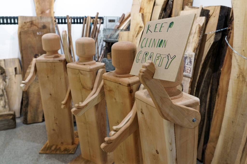 A peg person holds a sign that says Keep Clinton Crafty. (Photo by David Welton)