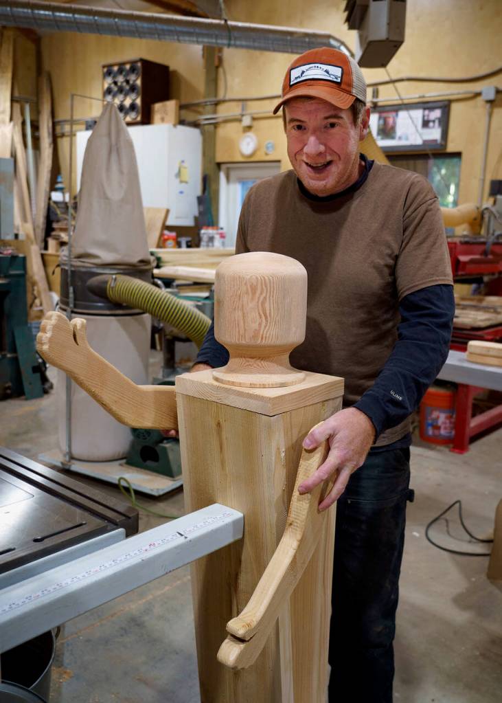 Kelly Cameron created the dolls to have movable arms so they can hold signs or trays. (Photo by David Welton)