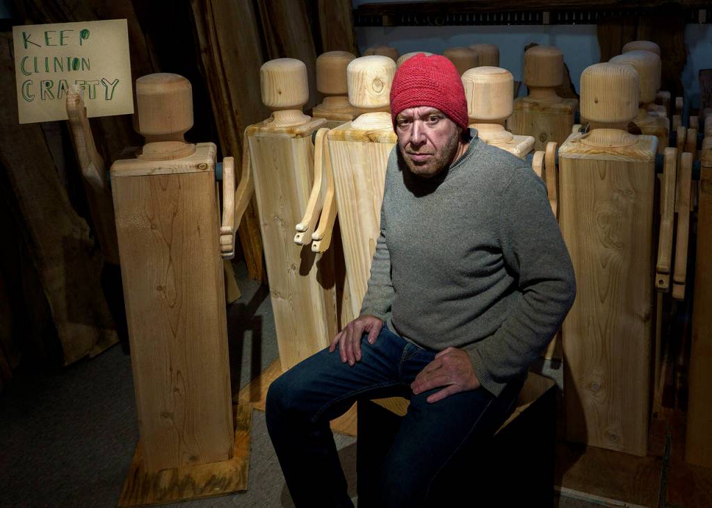 Kelly Cameron of Turnco Wood Goods created a bevy of giant wooden doll sculptures as part of a grant that was awarded to the Clinton Chamber of Commerce. (Photo by David Welton)