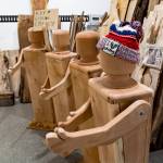 The giant wooden dolls are about four feet tall and can wear clothes, such as this hat. (Photo by David Welton)