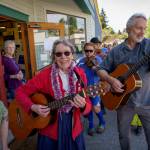 Linda Good and Karl Olsen, minister of music at Trinity Lutheran Church in Freeland, lead a farewell parade in song on May 20. (Photo by David Welton)