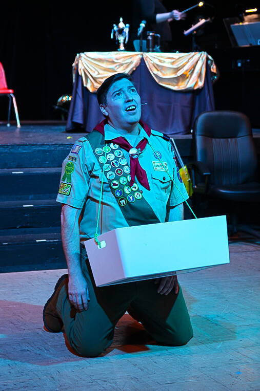 Chip Tolentino (Andrew Huggins) sings Chips Lament. (Photo by Luisa Loi)