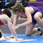 Oak Harbors Joel Christopherson competes during a regional tournament Saturday at Oak Harbor High School. He placed fourth and will compete in the Mat Classic this weekend at the Tacoma Dome. (Photo by John Fisken)