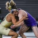 Arlingtons Tre Haines and Oak Harbors Percie Hatfield wrestle during the 3A boys 157-pound championship match during Mat Classic XXXV on Saturday, Feb. 17, 2024, at the Tacoma Dome in Tacoma. (Annie Barker / The Herald)