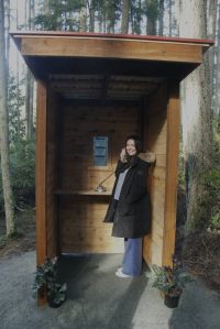 Photo by Kira Erickson/South Whidbey Record
Suzie Reynolds demonstrates how to use the new wind phone at Trustland Trails Park.
