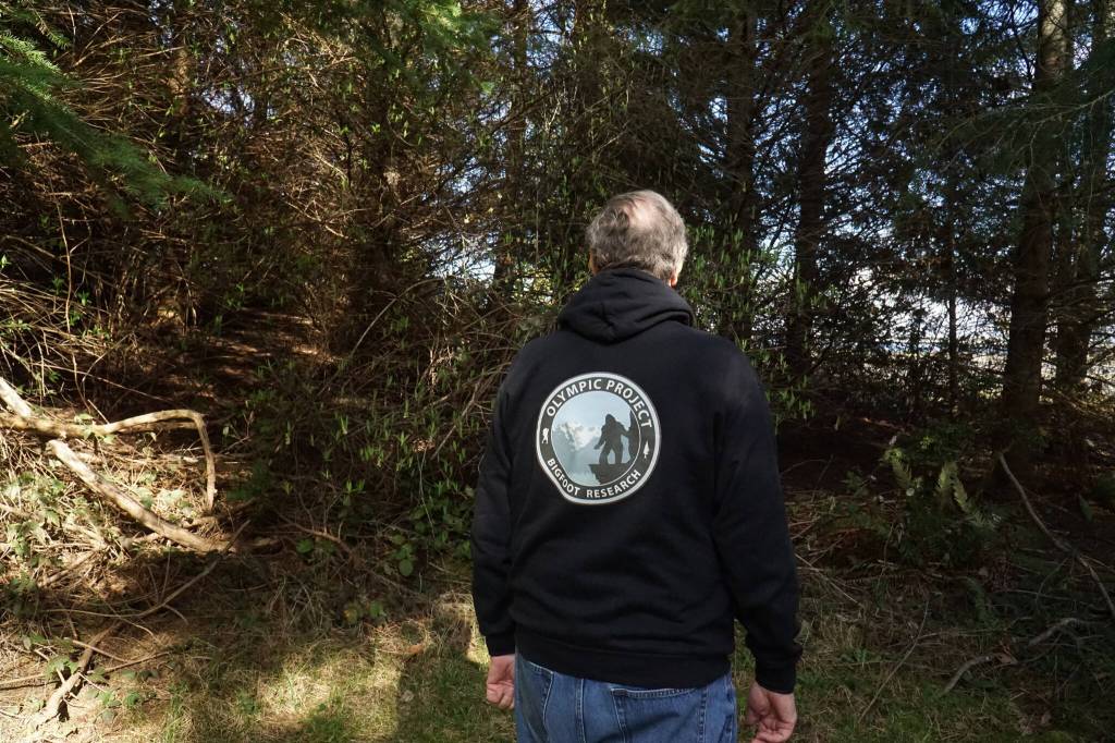 Whidbey bigfoot researcher David Ellis explores the woods outside Langley (photo by Sam Fletcher)