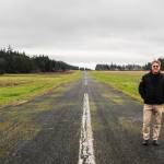 Photo by Luisa Loi
Robert DeLaurentis stands on the 3,250 feet long runway at DeLaurentis International Airport. The aviator is hoping to purchase a property to add more lenght to the runway, which also needs to be repaved and widened.