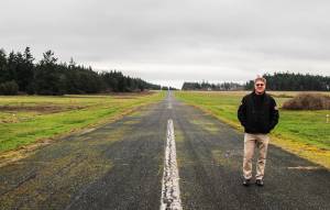 Photo by Luisa Loi
Robert DeLaurentis stands on the 3,250 feet long runway at DeLaurentis International Airport. The aviator is hoping to purchase a property to add more lenght to the runway, which also needs to be repaved and widened.