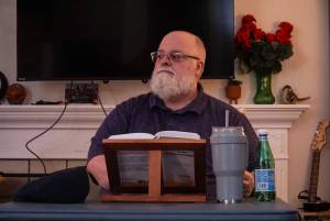 Photo by Sam Fletcher
Oak Harbor resident David Robbins leads the discussion at a Kabbalah study session.