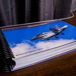 Naval Air Station Whidbey Island includes photos of aircrafts and the stories behind them, highlighting the police department, fire department, Search and Rescue, maintenance department, air traffic control and others. (Photo by Sam Fletcher)