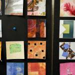 Cyndy Jensen, Karen Rothboeck and Linda Schrock created a total of 200 miniature artworks to display in the Freeland Library for the month of March. Admirers are encouraged to take a piece home with them. (Photo by David Welton)