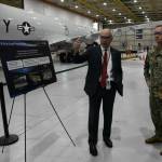 Vice Adm. John B. Mustin, Chief of Navy Reserve and Commander, Navy Reserve Force, receives a tour from Perry Yaw, Business Development Lead for Boeing P8 Program, before taking delivery of the first new P-8A Poseidon for the Naval Air Force Reserve during a ceremony at Boeing Military Delivery Facility in Tukwila, Washington, March 6, 2024. This first delivery of the new P-8A Poseidon is a historic moment as it is the first purpose-built aircraft sent directly to the Navy Reserves defense architecture in its aggressive transformation as an elite warfighting organization. Our patrol aircraft deploy and operate globally in support of national defense priorities executing myriad missions ranging from supporting homeland defense (HLD), participating in exercises sustaining fleet readiness, and work alongside partner and allied nations maintaining proficiency and increasing interoperability. (Photo courtesy of the US Naval Air Force Reserve)