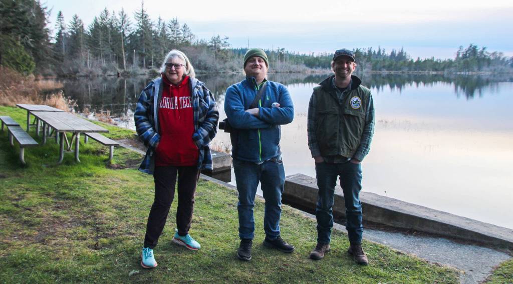 Meg Lunnum, Tom Riecken and Kurt License pose for a photo after releasing seven bats at Deception Pass State Park. (Photo by Luisa Loi)
