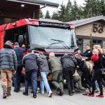 During the dedication ceremony, community members pushed a fire engine inside the new building. Fire Station 53 is dedicated to emergency responders and the citizens they protect. (Photo by Luisa Loi)