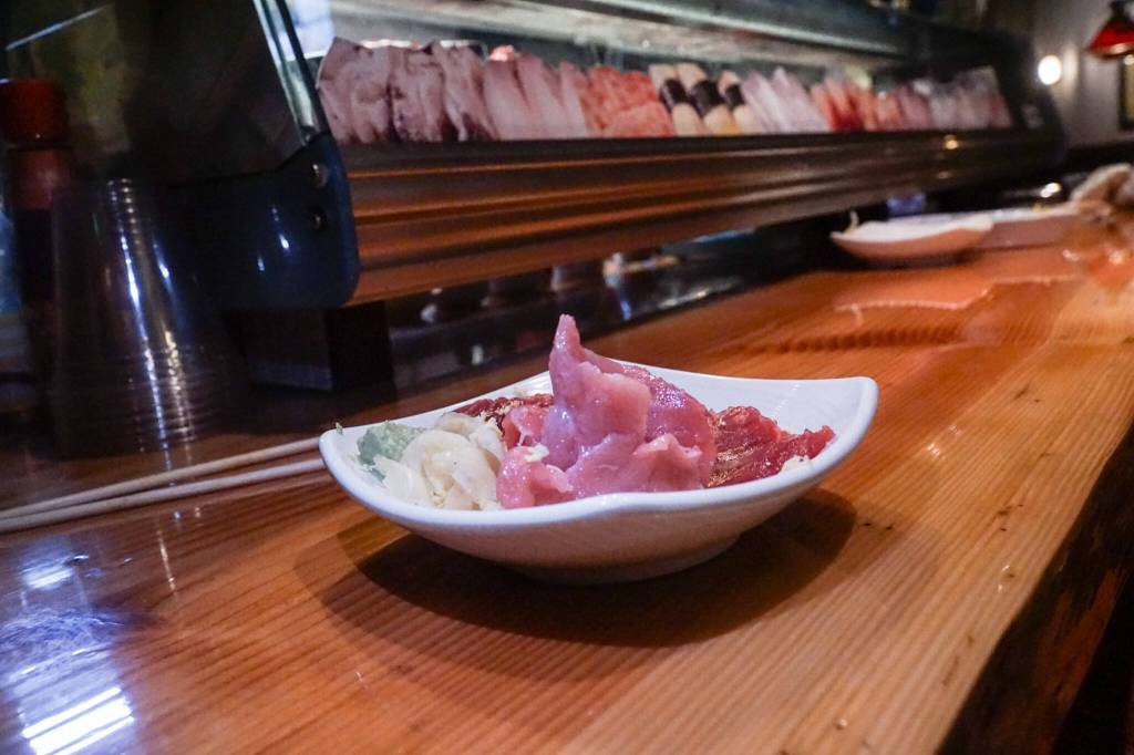 Sushi chef Claude Johnston serves bluefin tuna from the Mediterranean. (Photo by Sam Fletcher)