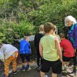 Photo courtesy of Whidbey Watershed Stewards
Candace Jordan and future watershed stewards inspect the wetlands.